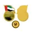 UAE-Flag-Badges-2094-UAE-Gold-600x600-1-1.webp